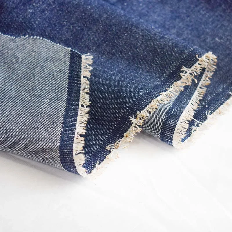 工場卸売在庫価格デニム生地光沢のあるジーンズデニム生地、ジーンズ、ズボン、コート、キャップのヤード単位販売