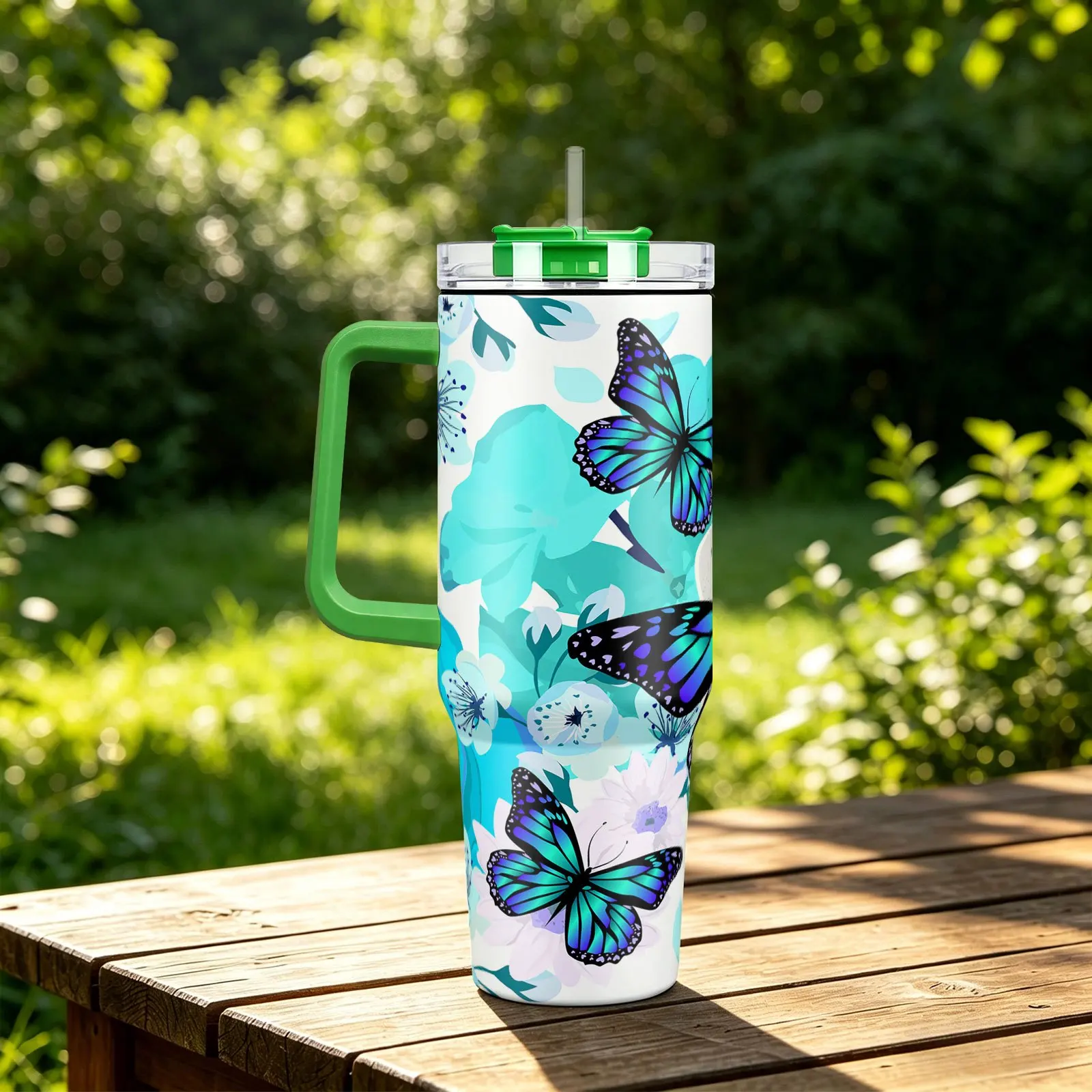 A 40oz Insulated Tumbler, Cold Drink Cup, and Mug with a Multi-color Handle, Lid, and Straw. Features a Blue Butterfly and Floral Pattern. Suitable for Home, Restaurants, Outdoor Sports, and Car Use. A Versatile Water Bottle, an Ideal Gift Choice