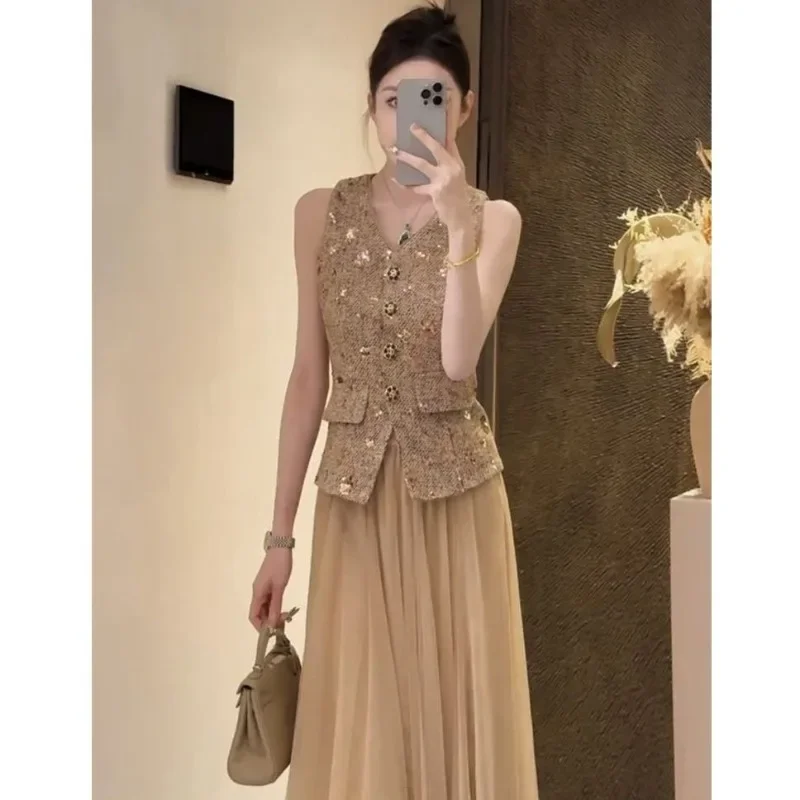 Set da due pezzi da donna francese nuova estate moda gilet sottile senza maniche con paillettes + gonna longuette a trapezio in rete piccolo abito profumato