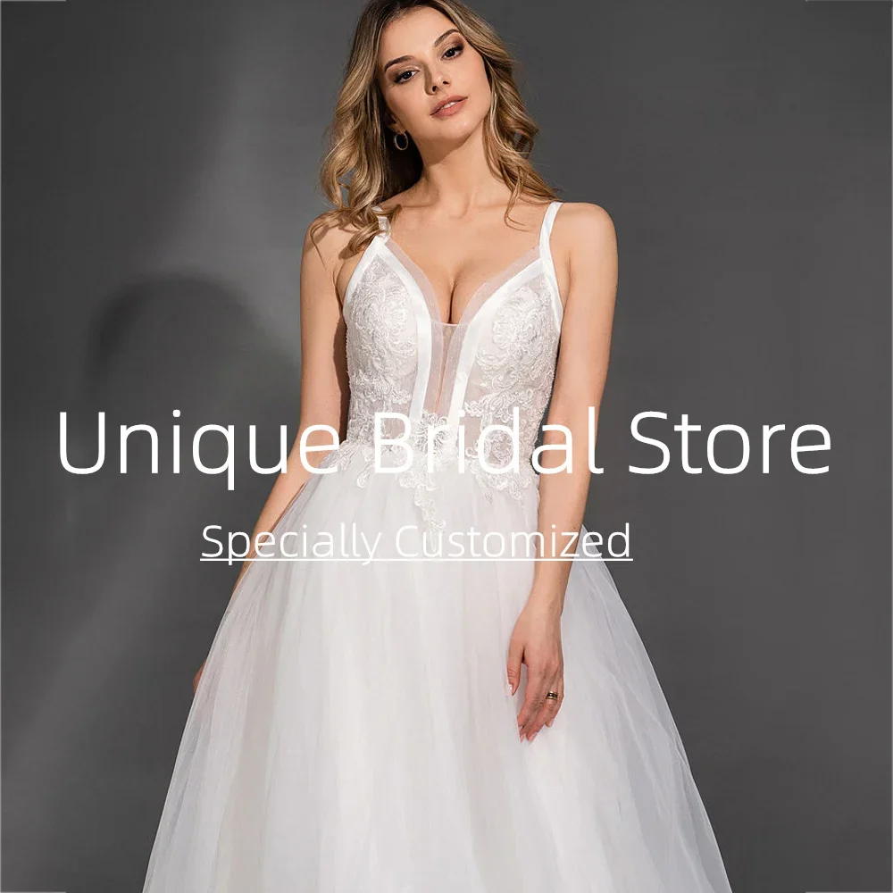 Suknie ślubne na zamówienie, seksowne, eleganckie, w kształcie litery A, z trenem zamiatającym, na ramiączkach spaghetti, bez rękawów, z odkrytymi plecami, urocze aplikacje, suknia ślubna.