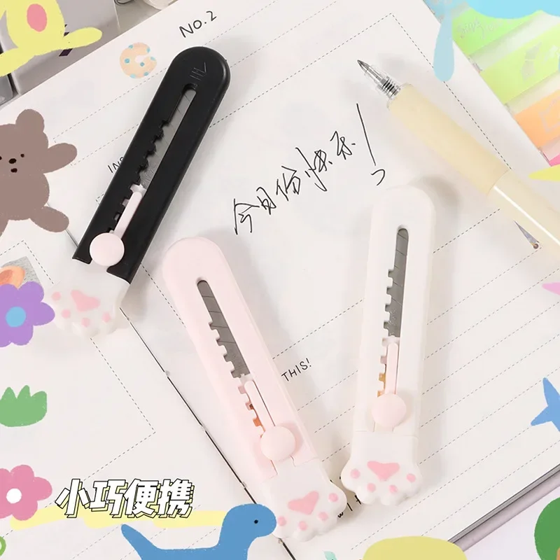 

1pc Kawaii Mini Pocket Cat Paw Art Utility Knife Express Box Knife Paper Cutter Craft Wrapping Refillable Blade Stationey