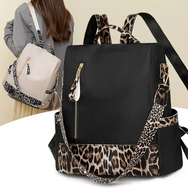 Mochilas informales de nailon a la moda para mujer, mochilas de gran capacidad 2024, con estampado de leopardo Simple, bolsillo Interior con cremallera, mochilas de estilo básico