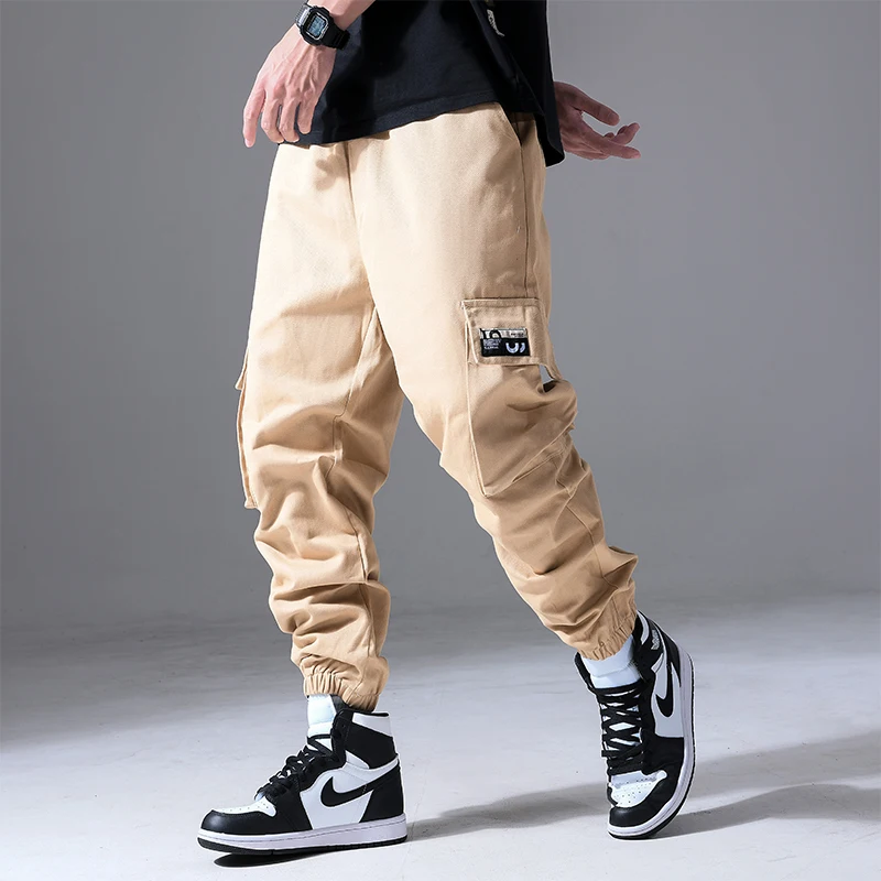 Moda męska Hip Hop Cargo spodnie z wieloma kieszeniami modna odzież uliczna solidne spodnie dresowe Casual bawełniane biegacze męskie — zdjęcie 6