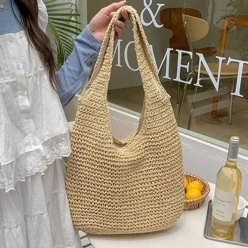 High-end hand-woven straw tote bag for women – large capacity beach vacation bag with versatile seaside style