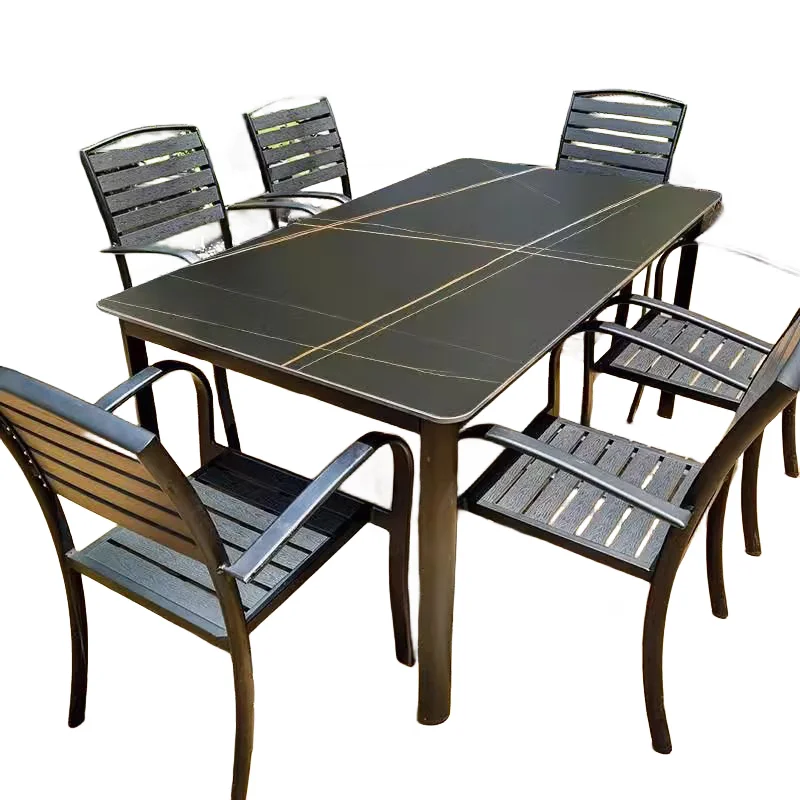 

Outdoor tables and chairs rock slab courtyard