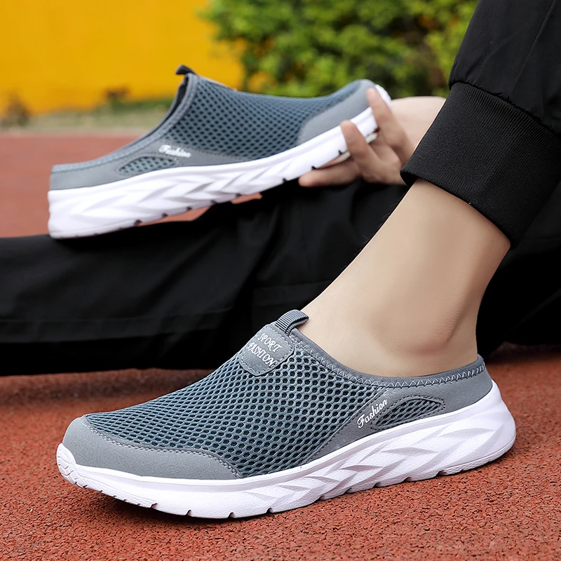 รองเท้าลำลองใหม่สำหรับผู้ชายรองเท้าครึ่งข้อสลิปเปอร์ sepatu SLIP ON ผู้ชายรองเท้าตาข่ายระบายอากาศได้ดีนุ่มสบายสำหรับฤดูร้อน