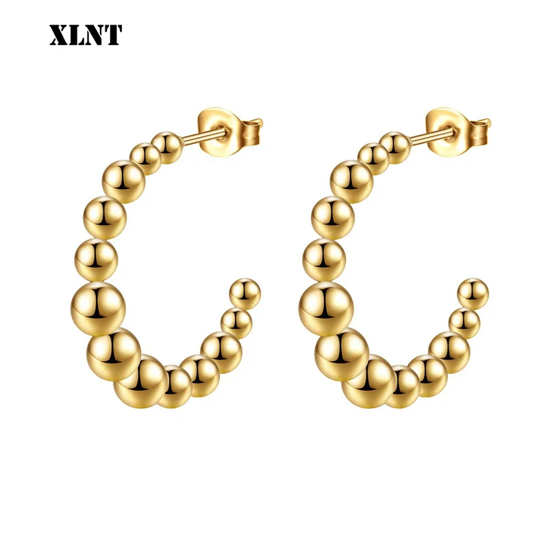 كل ما تحتاج معرفته عن الأقراط المعدنية البسيطة XLNT