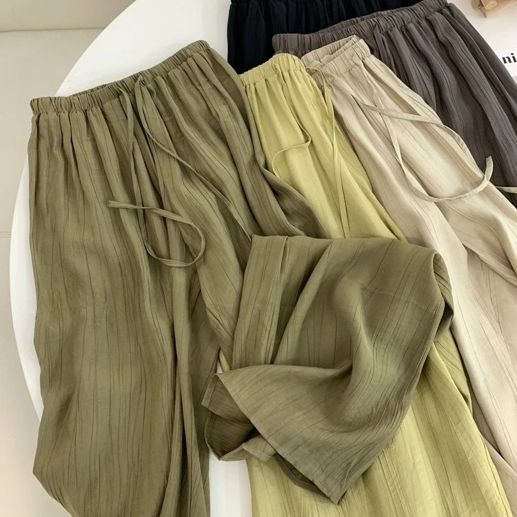 Abbigliamento donna pantaloni a gamba larga pieghettati a vita alta allentati estate Casual Cool cintura di colore solido semplice sottile ufficio signora cotone