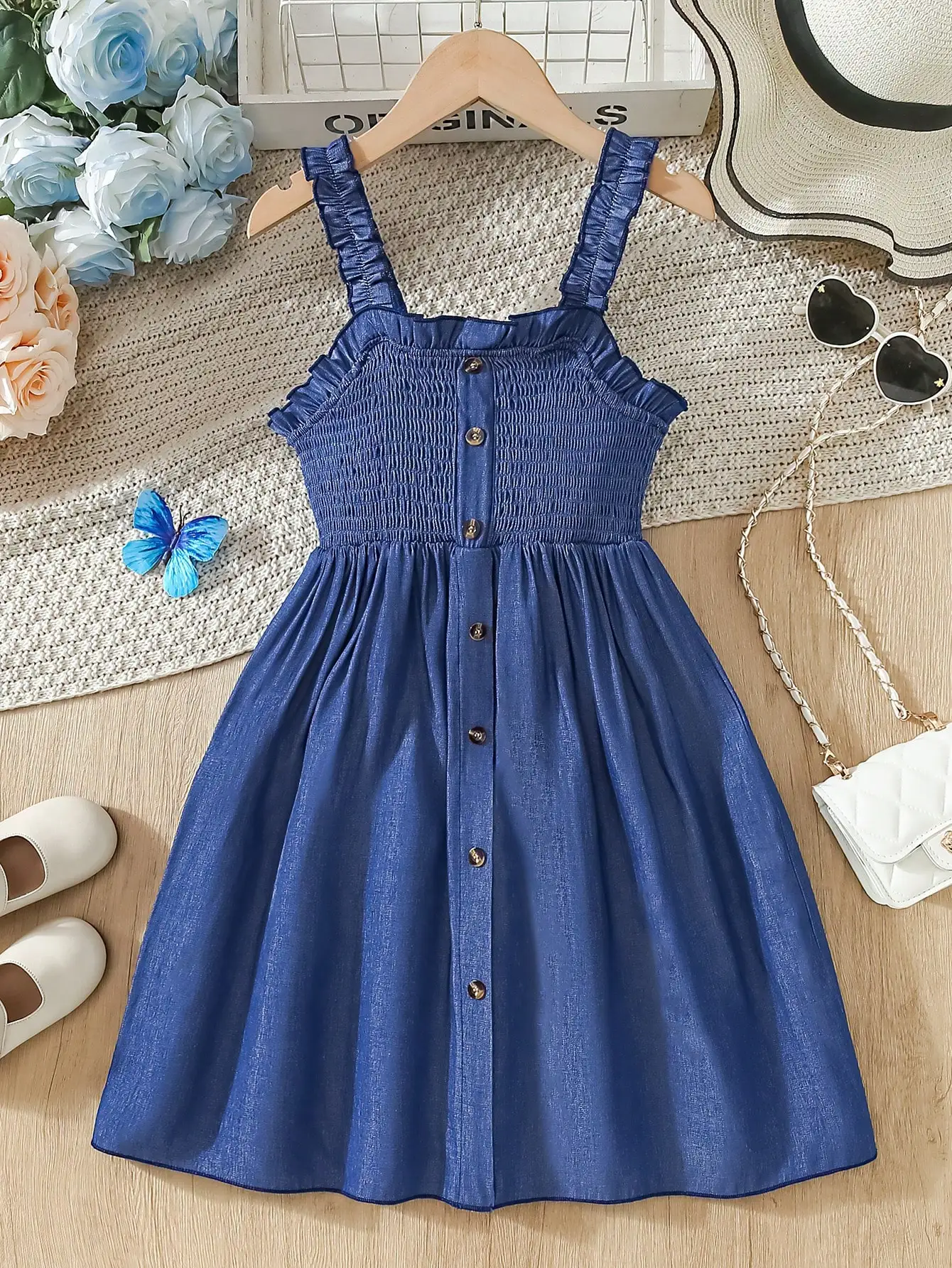 

Blue Smocked Sleeveless Dress With Ruffle Straps And Button Front