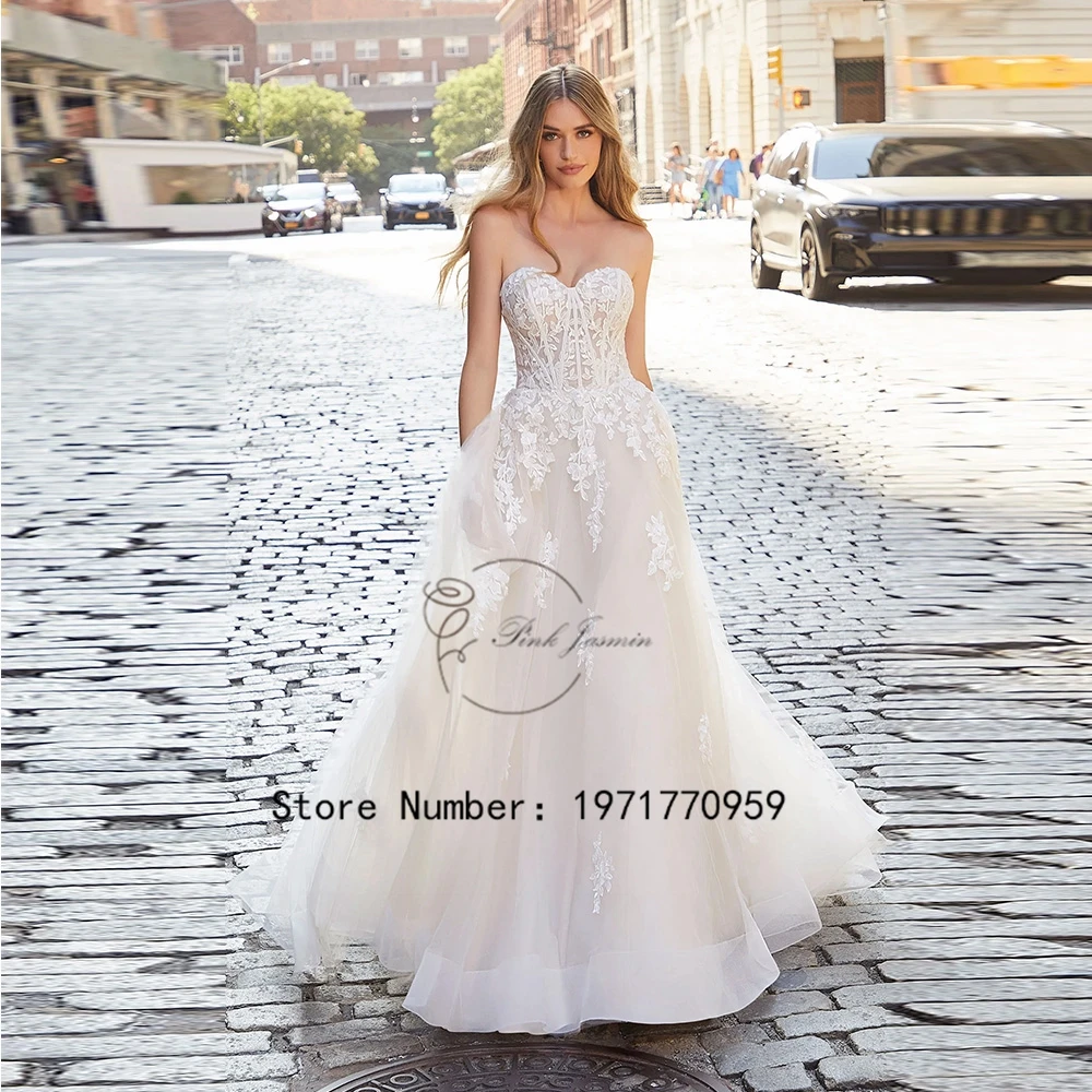 

Classic Strapless Wedding Dress For Princess Applique Elegant Tulle Bridal Gowns Simple Button Back Court Train Vestido De Novia