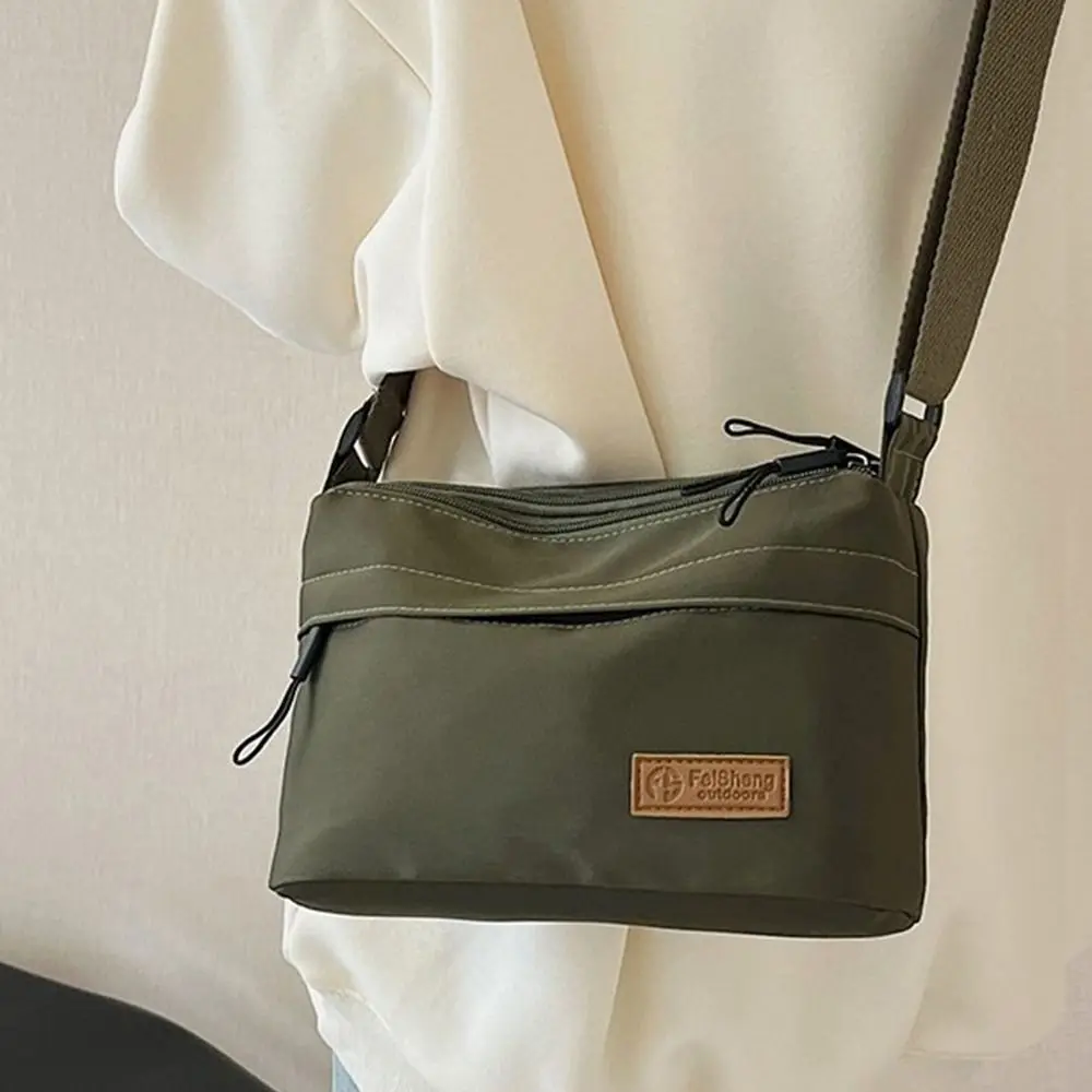 حقيبة كتف كاجوال عصرية عبر الجسم بسيطة ذات سعة كبيرة ومتعددة الجيوب حقيبة يد محمولة حقيبة ساعي البريد