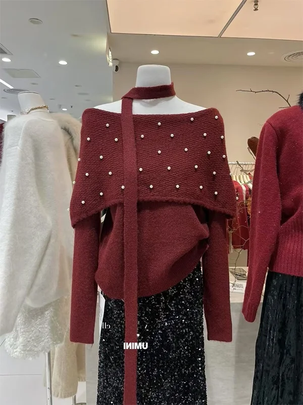 

Корейский стиль: Элегантный комплект из свитера с жемчужными элементами на плечах и юбки. Удобный повседневный крой, длинный рукав, вязаная одежда.