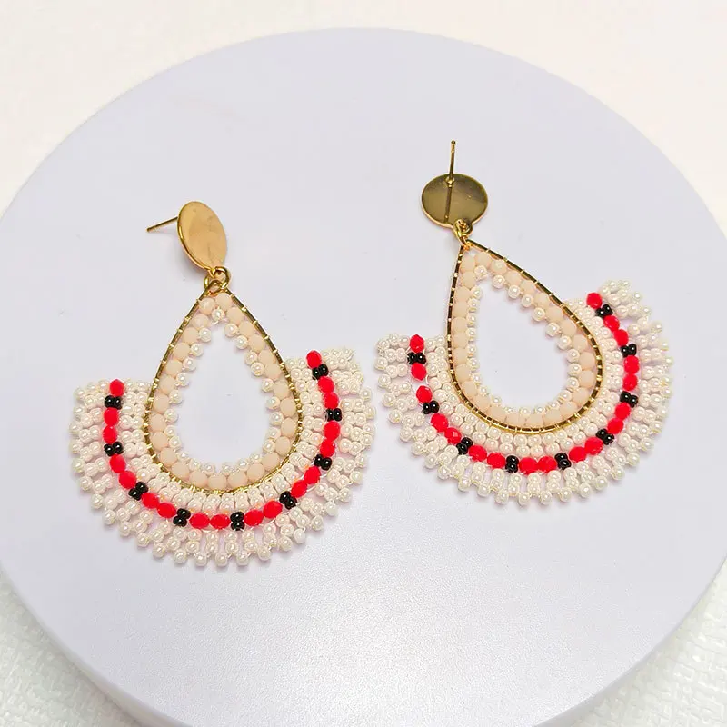 Beaded earrings Water drop Originality Hand knitting Bohemia Alloy Hollow out Tide Simple Geometry Rice bead earrings