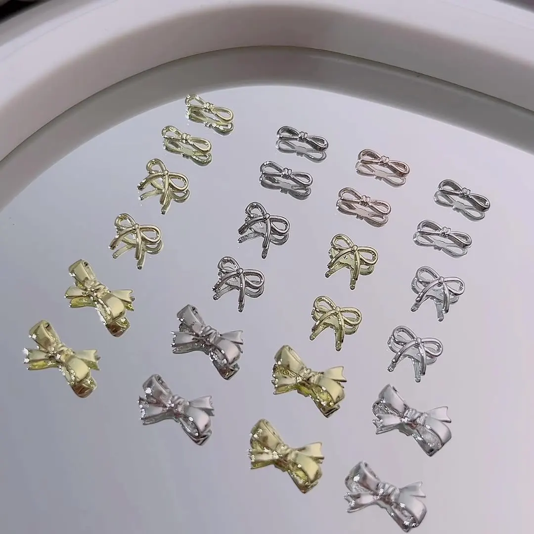 رائعة Bowknot اللؤلؤ الشريط حجر الراين ربطة القوس فيونكة الذهب الفضة سبائك معدنية شيك مسمار الفن زينة سحر مانيكير اكسسوارات