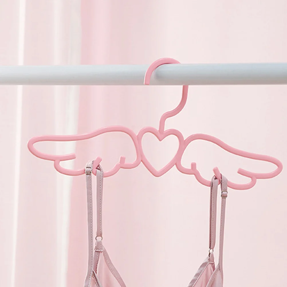 شماعة بلاستيكية على شكل جناح وردي، شماعة ملابس غير قابلة للتشوه للأوشحة، أحزمة لتوفير المساحة، حل تخزين الخزانة