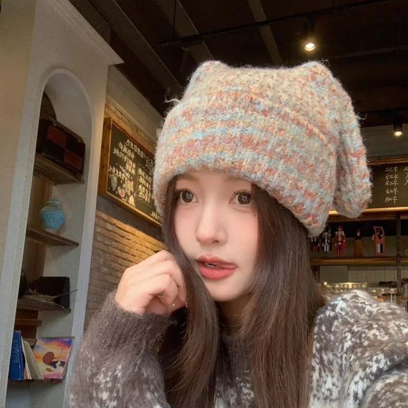 

Новая корейская версия 2026 года: осенне-зимняя женская вязаная шапка с забавными большими ушками, придающая образу милый и стильный вид.