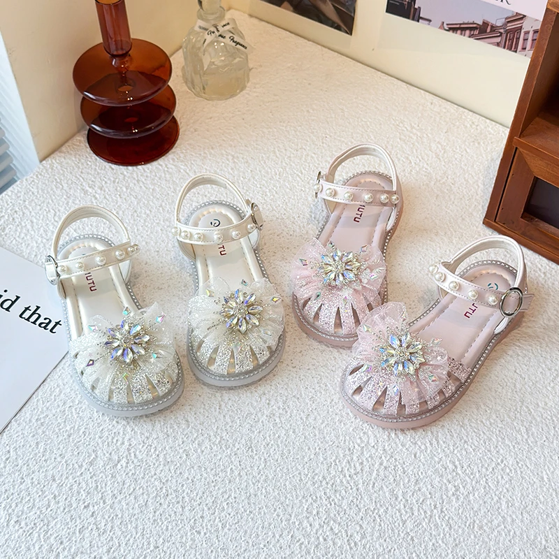 

Girls' sandals 2025 new style summer baby girl pearl little girl bowknot soft bottom princess shoes toe-covering crystal shoes