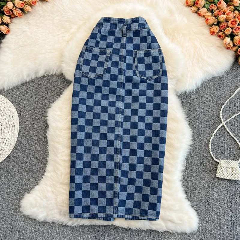 Personalità della moda Scacchiera Griglia Forcella aperta Gonna a trapezio in denim Versione coreana delle gonne sottili di media lunghezza a vita alta