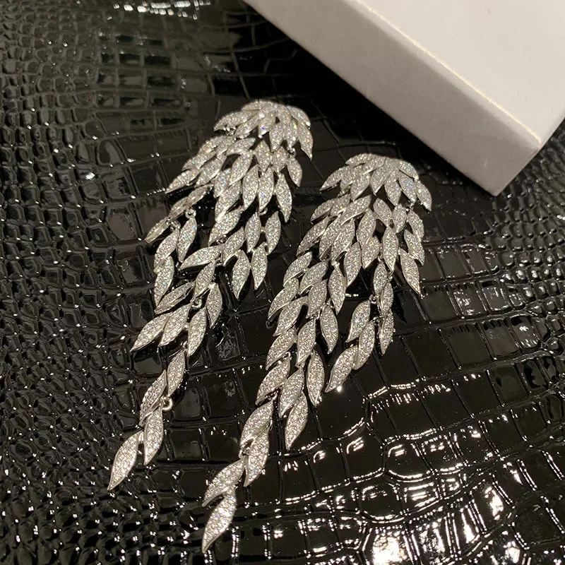 

Leaves feather earrings long fringe personality exaggerated