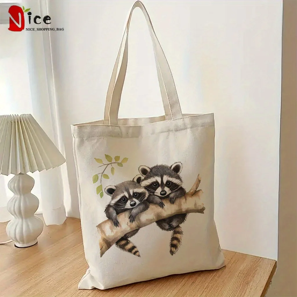 Bolso de lona con estampado de mapache en una rama de árbol, adecuado para uso diario, compras, escuela y viajes.