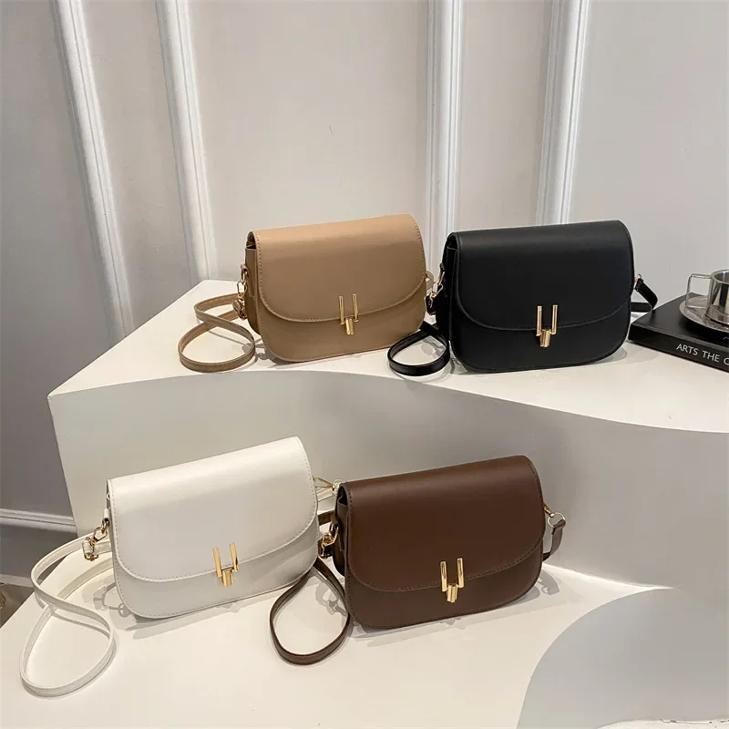 

Women's 2025 Spring New Simple, Trendy and Elegant Crossbody Saddle Bag with Niche Design Lock Buckle