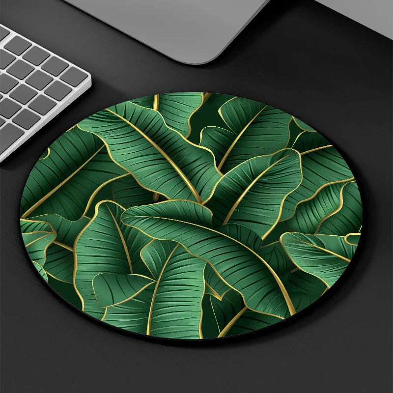 Tropical leaf-designed circular mousepad with waterproof anti-slip rubber is suitable for office jungle-themed desk decoration