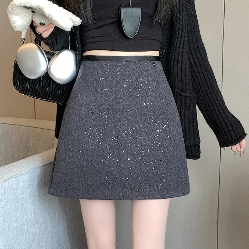 Xiaoxiangfeng Sparkling Heavy Industry sequin A-line skirt for women in winter, thick woolen half skirt, hip hugging short skirt