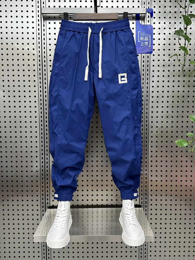 

Drawstring Men Sports Pants Casual Pockets Thin Jogging Pants Men Fitness Joggers Running Pants Loose Sweatpants Sportswear