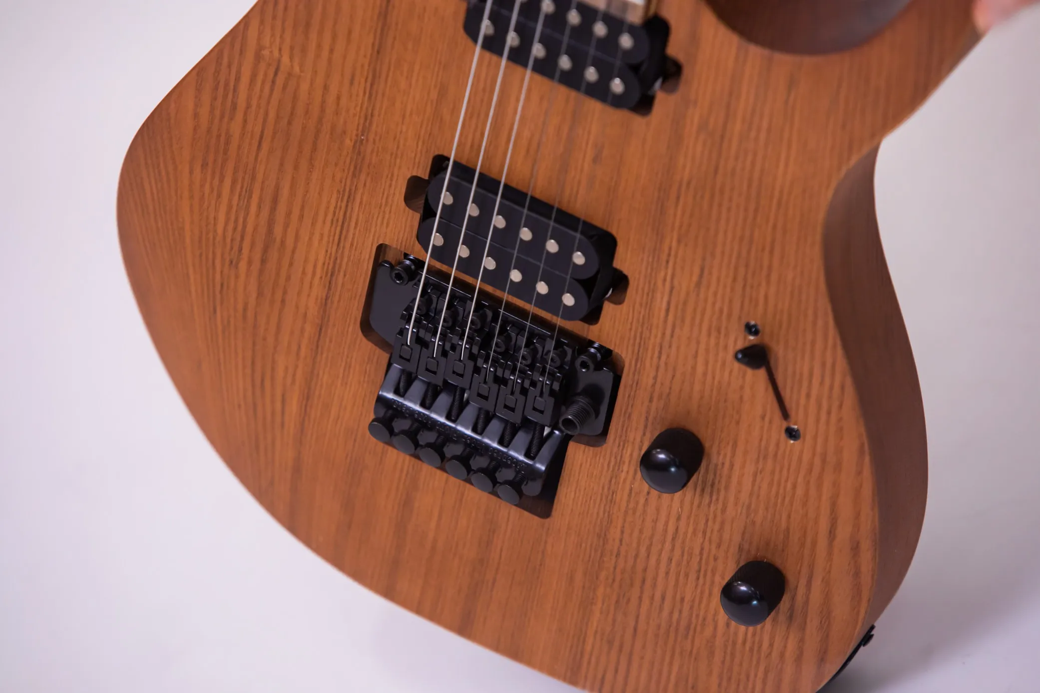 Custom-made model, the body has a cut-out, the pickups are double, single and double, the fretboard is with a floral pattern