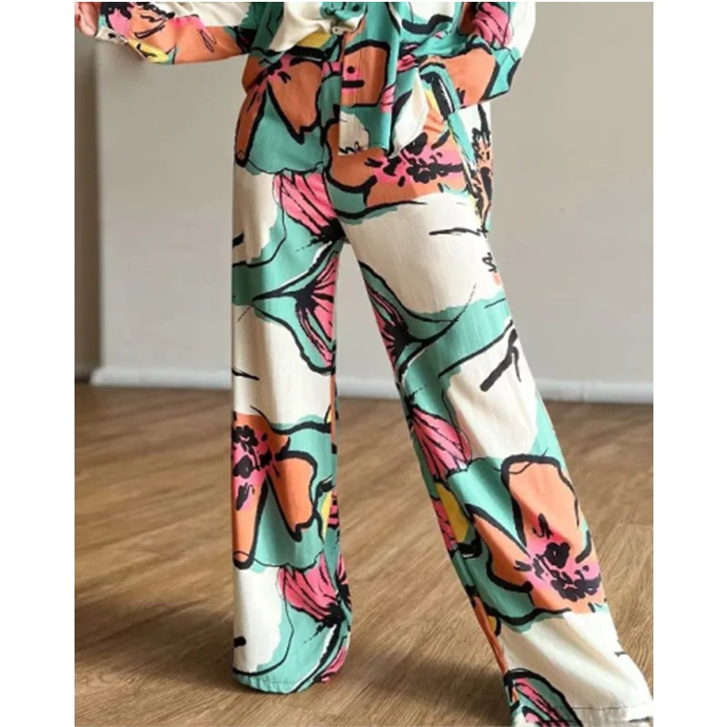 Abito da donna con stampa pendolare alla moda 2025 Autunno Nuovo stile Risvolto Camicia ampia a maniche lunghe Vita alta Pantaloni a gamba larga Set a due pezzi