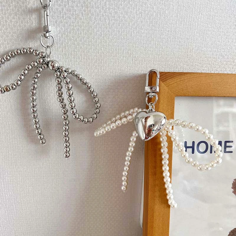 

Ins Style Bowknot Beaded Key Chain Three-dimensional Silver Heart Phone Pendant Headphone Case Charm Car Key Ring Bag Decor