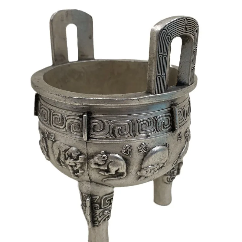 Antique-style white bronze tripod incense burner with double handles, featuring a relief carving of the twelve zodiac animals, a