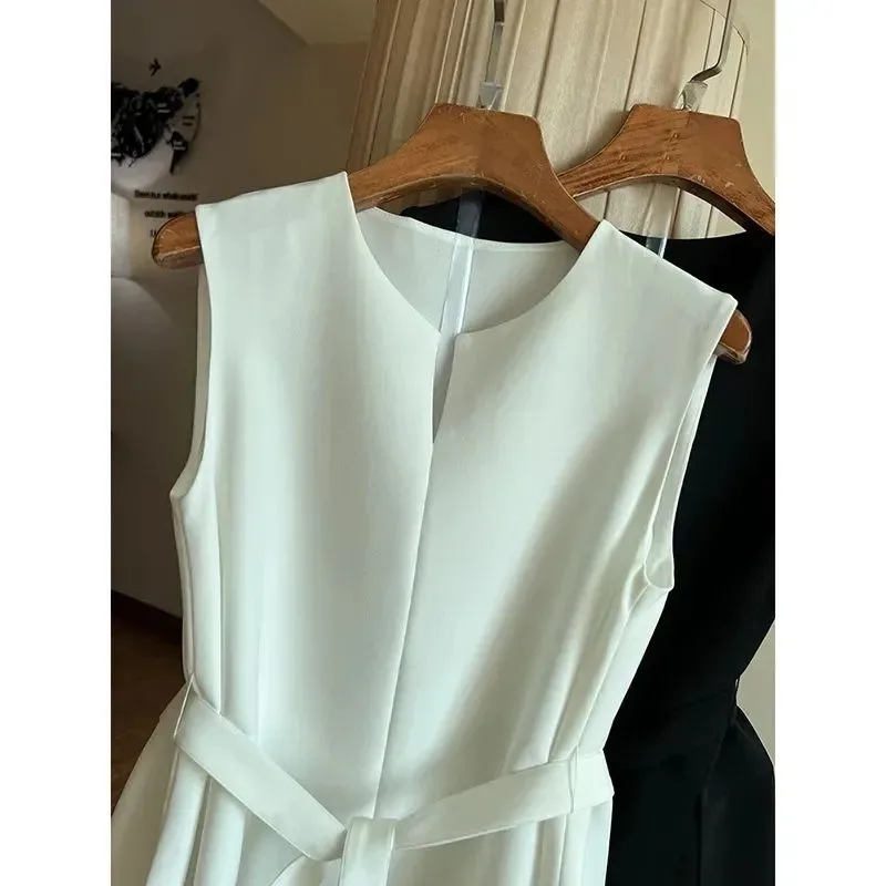 Chemise blanche de Style minimaliste français pour femmes, nouvelle mode printemps et été, sans manches, haut de gamme, chemisiers Slim pour femmes