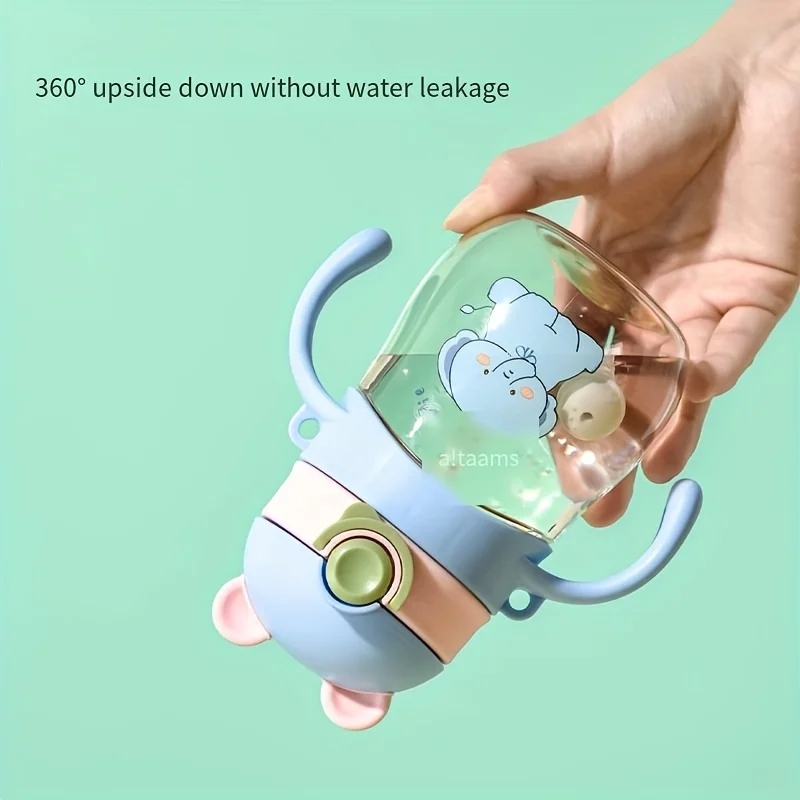 Cute Cartoon-Style Direct Drinking Water Bottle with a Plastic Handle, Designed for Learning to Drink.