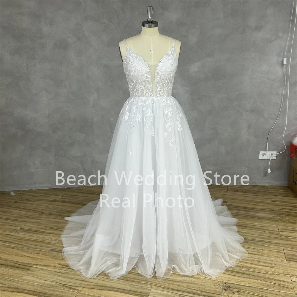 Praia personalizado cinta de espaguete profundo decote em v vestido de casamento para noiva rendas apliques brilhante tule sem costas lindos vestidos de noiva