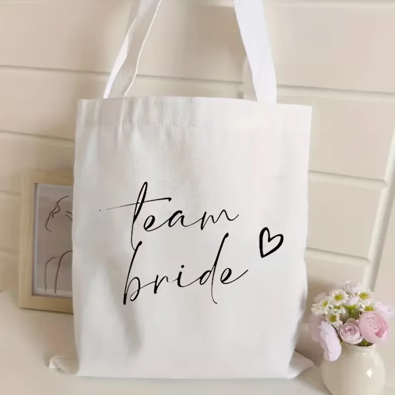 Bride Team Canvas Tote Bag Stylish Large Capacity Reusable for Wedding Daily Use Commute Shopping Beach Travel Parties.