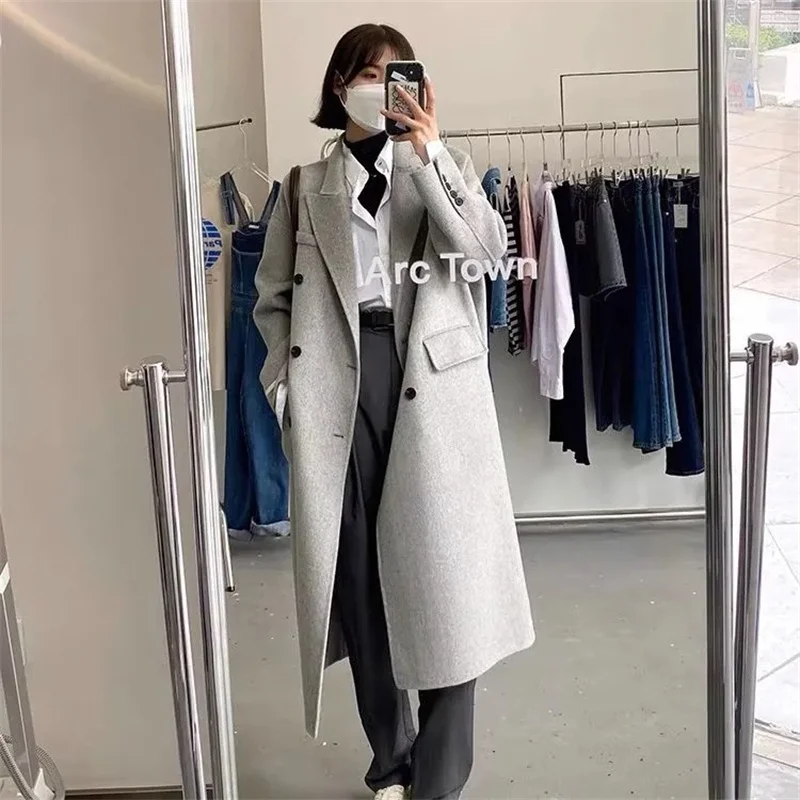 ใหม่ฤดูใบไม้ร่วงฤดูหนาวเสื้อโค้ทยาวผู้หญิงหลวมพอดีความยาวปานกลางเฮปเบิร์นสไตล์เสื้อขนสัตว์หนาแขนยาวสีทึบ