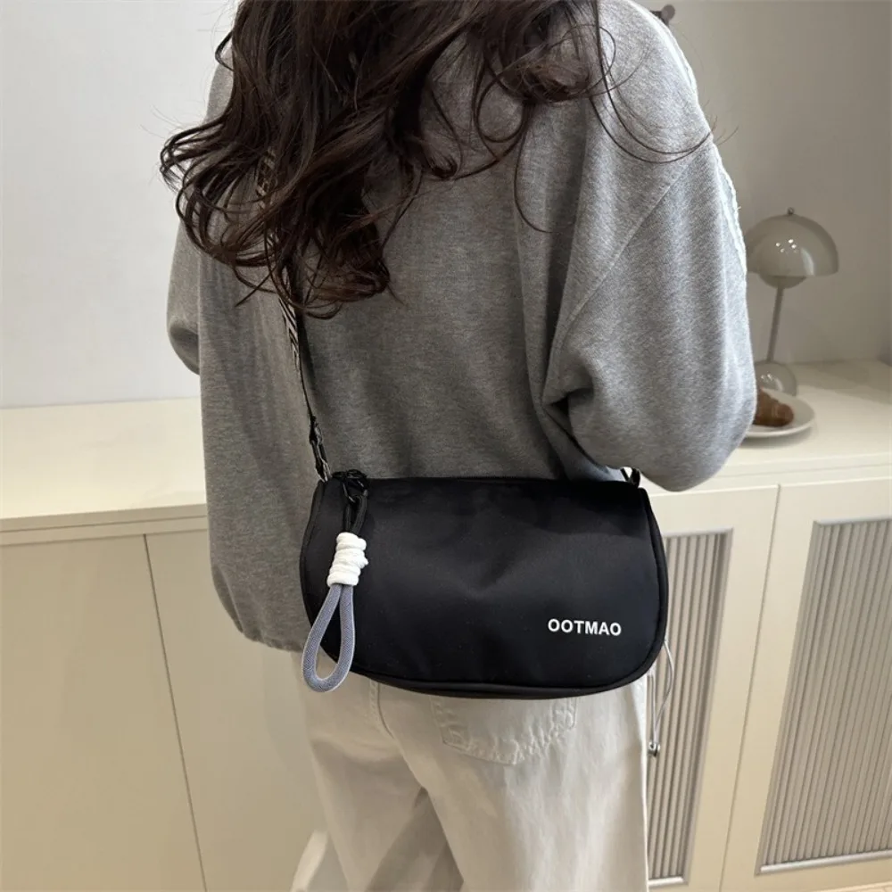 

Solid Color Canvas Crossbody Bag Korean Style Large Capacity Nylon Shoulder Bag Wide Shoulder Strap Zipper Bucket Bag