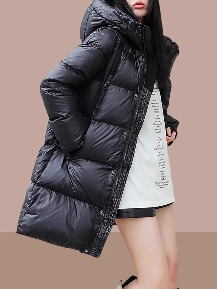 

Зимнее утепленное пальто-пуховик средней длины свободного кроя для невысоких и высоких людей, с хлопковым наполнителем