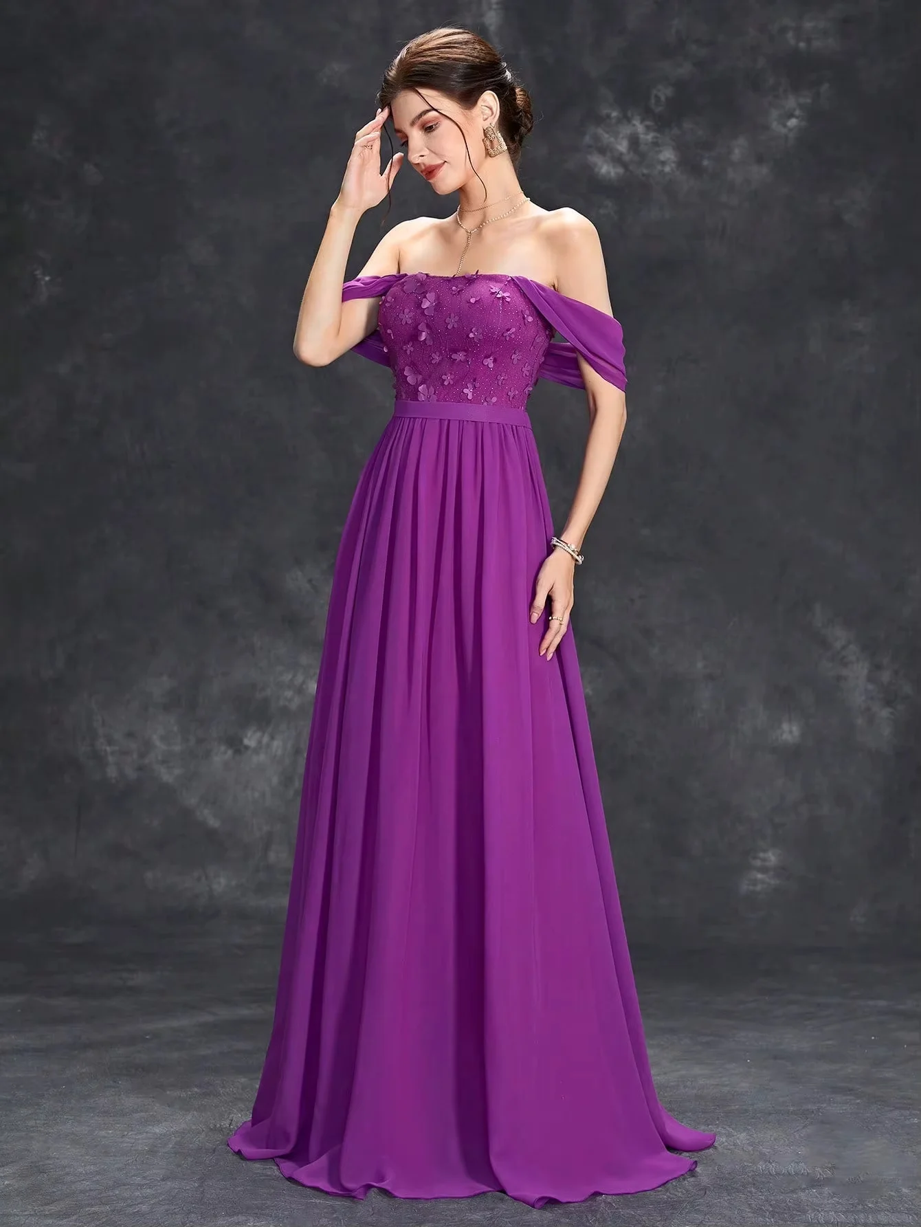 Stunning purple off-shoulder prom dress with elegant bodice and flowy chiffon floor-length skirt. Custom sizes available. Ideal