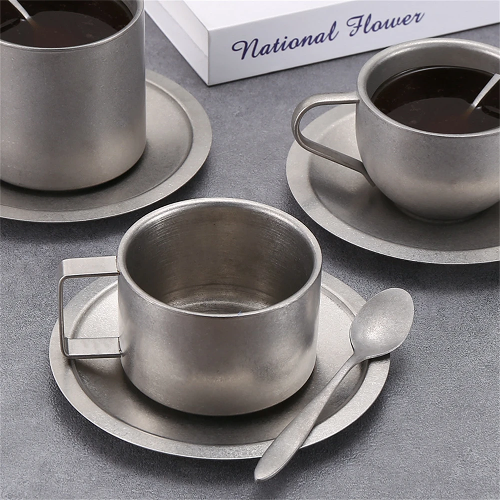 

Classic Stainless Steel Coffee Cup Set with Matching Spoon and Mat Designed to Keep Drinks at the Right Temperature