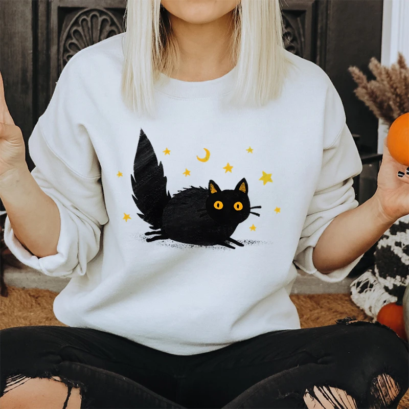 Felpa da donna alla moda con grafica gatto stelle e luna, occhi gialli, soffice gatto nero, tendenza, abbigliamento per ragazze, maglione gattino cartone animato