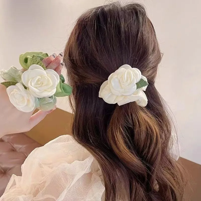 

Korean-style super-fairy camellia hair tie, new net-red hair tie for girls, flower-shaped large intestine hair tie