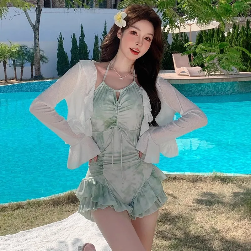 เกาหลีแฟชั่นชุดว่ายน้ําแบบอนุรักษ์นิยม One Piece พิมพ์ลายดอกไม้ย่น Ruffles ชุดมินิ Culottes บิกินี่ชุดว่ายน้ําเบาะ