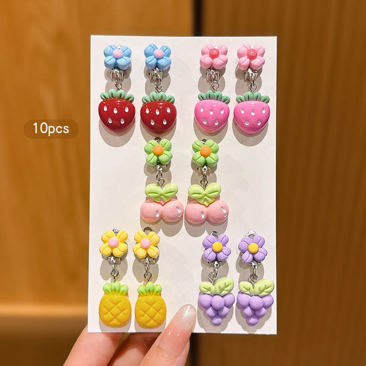 10 random styles of hair accessories, colored fruits, ear clips without ear holes