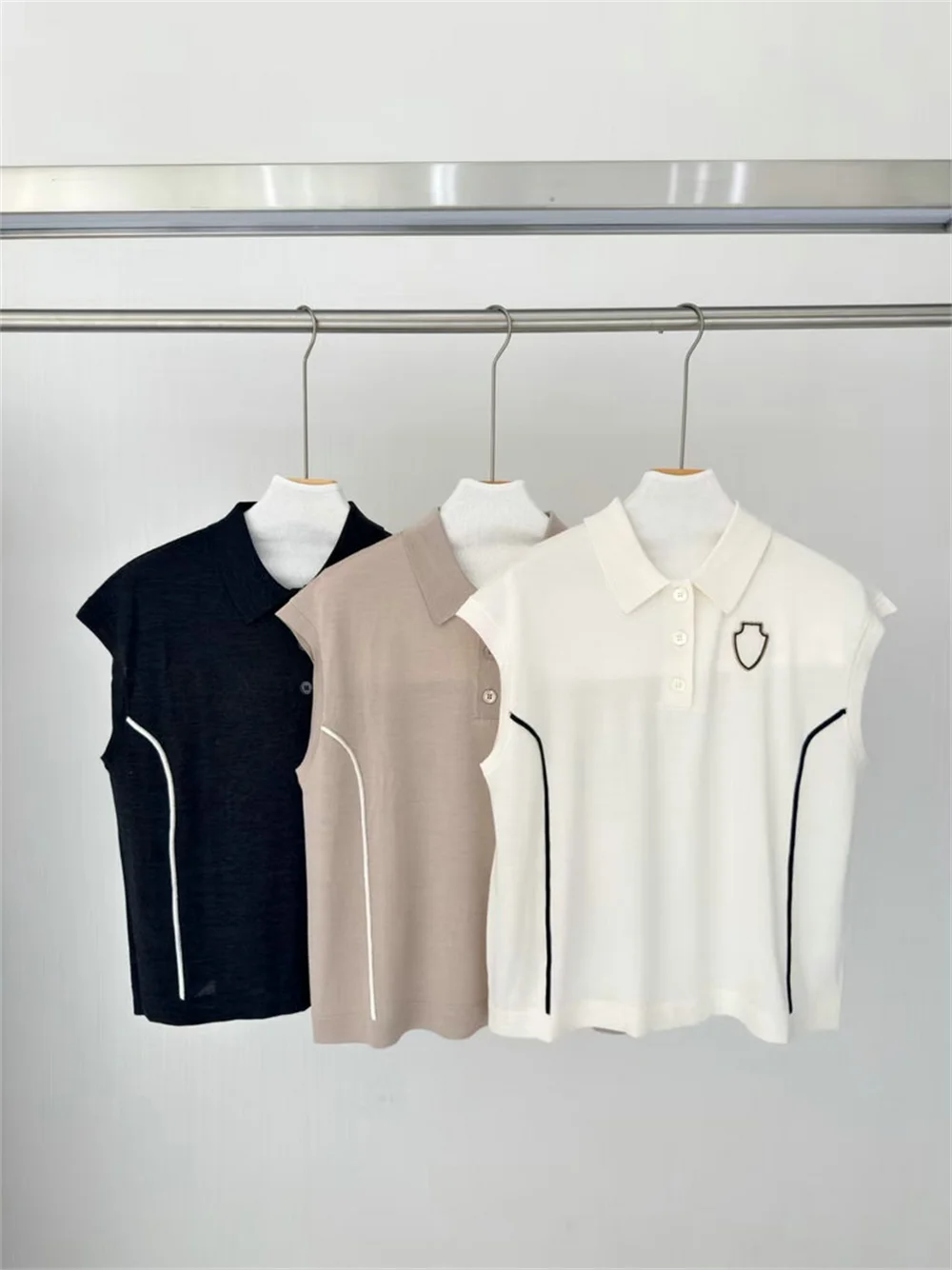 

Women Matching Two-Piece Sets Spring/Summer 2026 Sleeveless Polo Shirt and Tapered Pants and Trousers Suit