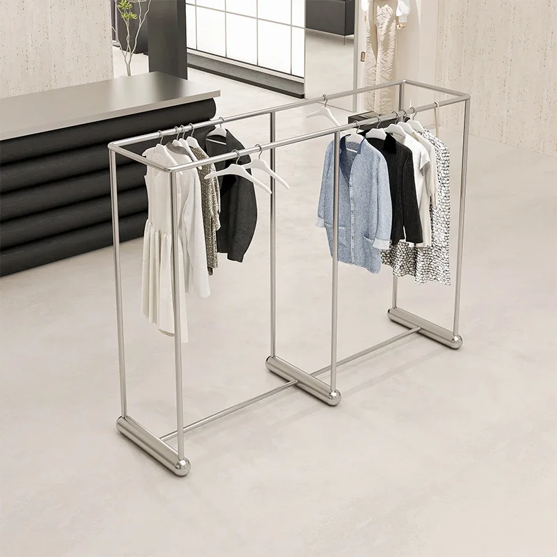 

Clothing store display rack Creative arc stainless steel brushed middle island rack Men's and women's clothing store L-shaped ha