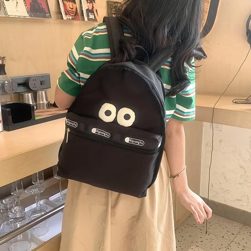 Appliques Letter Backpacks Funny Big Eyes Women's Bags on Sale 2024 High Quality Solid Zipper High Capacity Fashion Backpacks