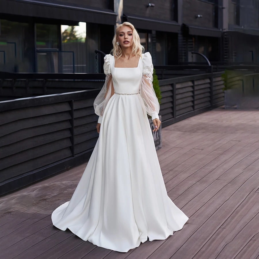 

Customized Boat Neckline Long Sleeves Satin Wedding Dress with Belt Crystals Illusion Back with Lace Bridal Dress vestido fiesta