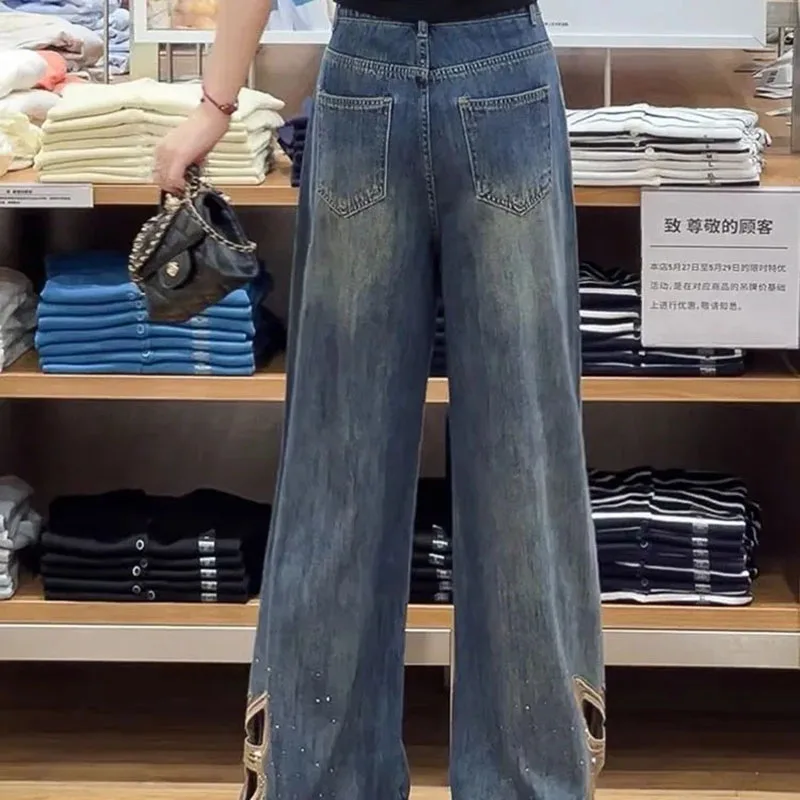 Nuevos pantalones vaqueros con mariposas bordadas caladas para mujer Primavera Verano nuevos pantalones vaqueros ajustados y ajustados de cintura alta a la moda para mujer